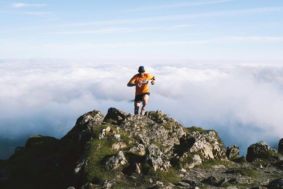 Trail runners exploring mountainous terrain with Milo running app